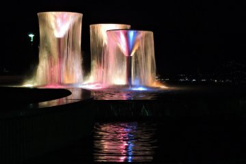<p>Lit up fountains at night</p>