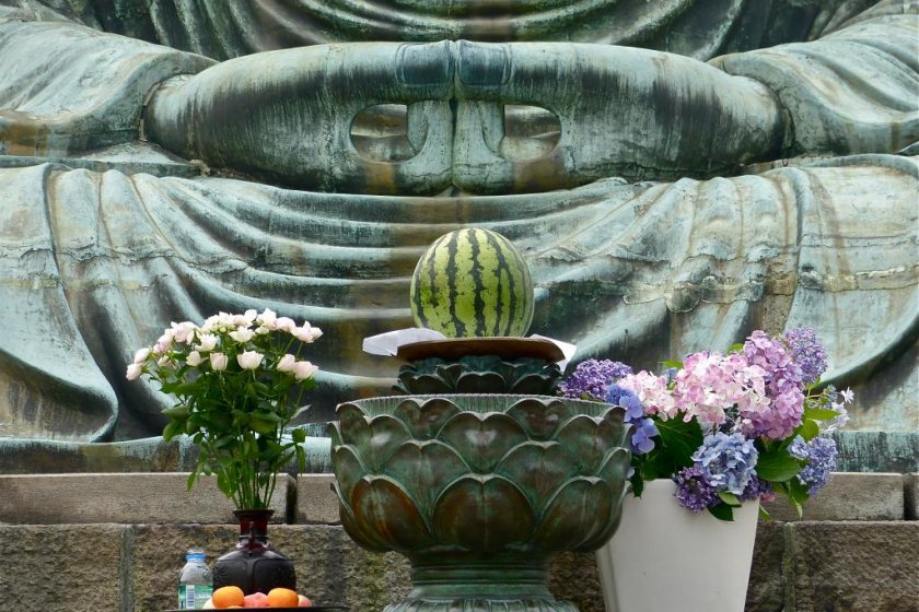 Flowers and seasonal fruits offered to Daibutsu