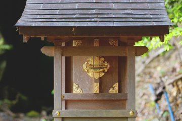 <p>A small shrine for the waterfall behind it, worshipping the pure water that comes from the surrounding area.</p>