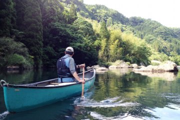 <p>Mr. Sukita leading the way with his canoe.</p>