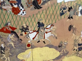 Традиционная японская ширма показывает сцены из жизни в период Эдо. Фото крупным планом