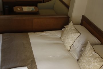 <p>The bed and sofa area.</p>
