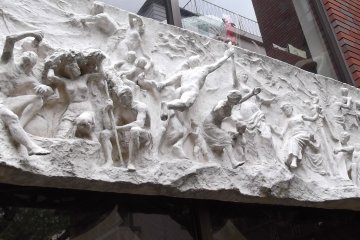 <p>A frieze on the outside of the museum</p>
