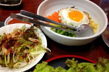<p>A set of Bibimbap, rice mixed with assorted herbs and vegetables, meat and fried egg, to complement the Samgyeupsal. The side dishes are superb!</p>