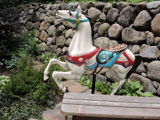 Long before I stumbled across the carousel I found this horse in the garden