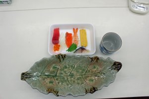The prepared sushi and serving plate