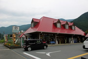 <p>Kawakami-mura&#39;s Sugi no Yu Michi no Eki (road station). The soba/udon noodle window is just in front of the car</p>