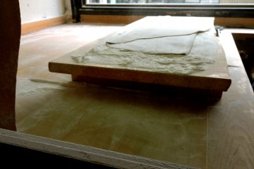 <p>Resting the rolled dough</p>