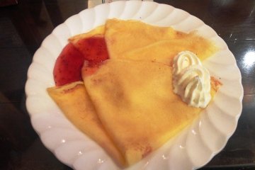 <p>Hand made crepes with strawberry jam and cream</p>