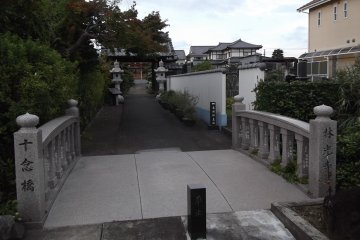 <p>Cross the bridge to the gate to the approach to the temple</p>