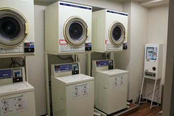 A coin laundry is located on the first floor
