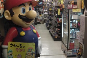Mario welcomes you at the door