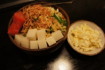 <p>Monjayaki with toppings, such as cod roe, rice cake and cheese</p>