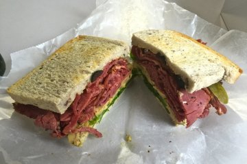 <p>A New York pastrami sandwich on whole wheat bread</p>