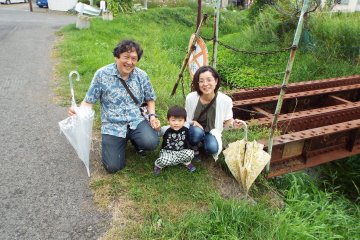 <p>Cousin and family at last piece of original train tracks</p>