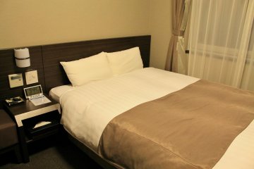 โรงแรม Dormy Inn Kagoshima ให้บริการห้องพักคู่และเดี่ยว 