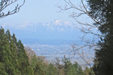 The Iiderenpo Mountains through a gap in trees