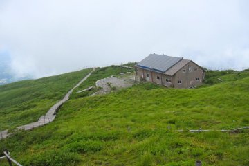 Looking down from the summit. The summit lodge offers toilets, shelter and a place to sleep