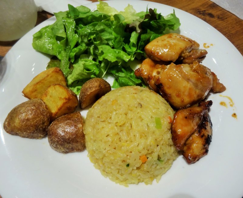 <p>The BBQ chicken plate comes with rice, potatoes and salad</p>
