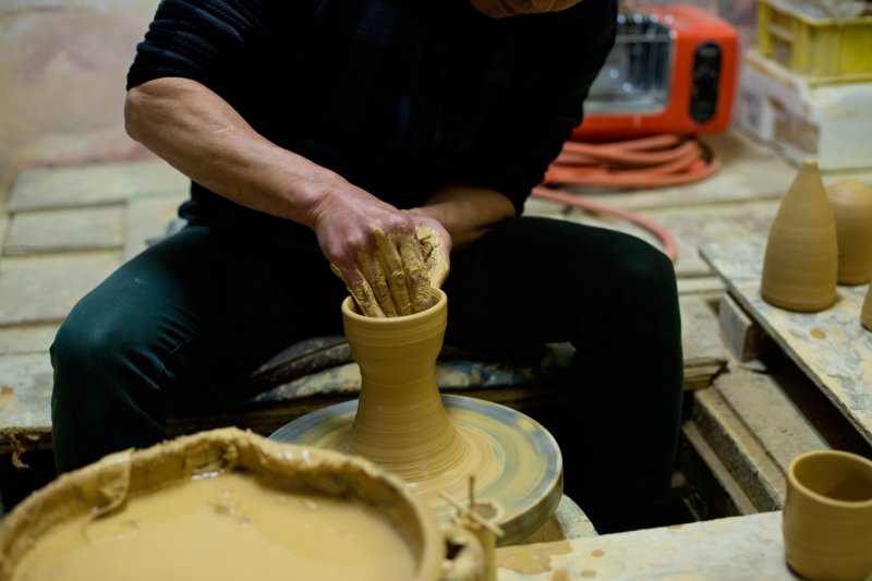 Mr. Kaneko working on a piece of pottery