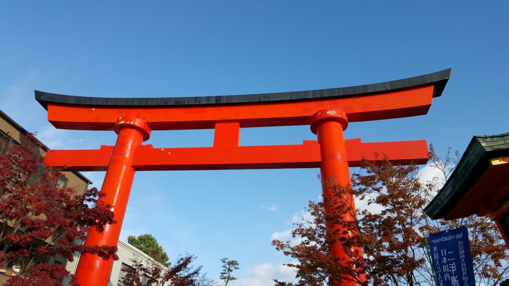 Red torii gate near the front of the shrine
