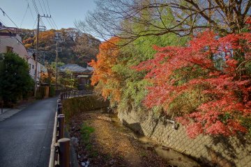 As you  walk past the entrance to Sugimoto Temple on your left, cross over to the road on the right and follow this river
