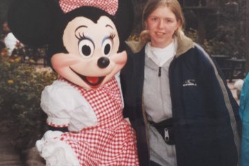 Nele in her first Disney character photo with Minnie Mouse