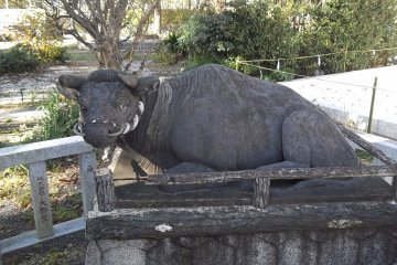 An ox statue guards the shrine