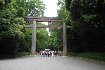 <p>The entrance to the shrine grounds is marked by a huge torii (gate).</p>