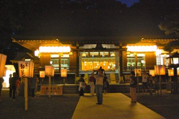 The shrine and lanterns casting mystical light