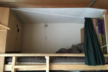 Each bunk bed had curtains for privacy