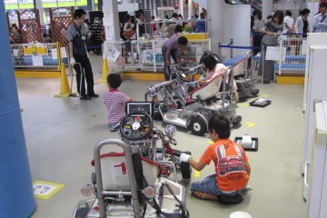 Kids 'working' in the mechanic section