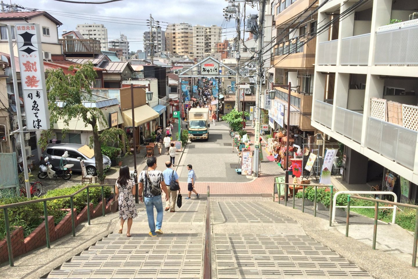 Just a walk down the stairs - The shopping street Yanaka Ginza entrance is welcoming you