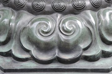 Swirls at the base of a pillar