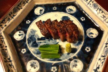 Slices of charcoal-grilled Japanese beef served with a hint of wasabi