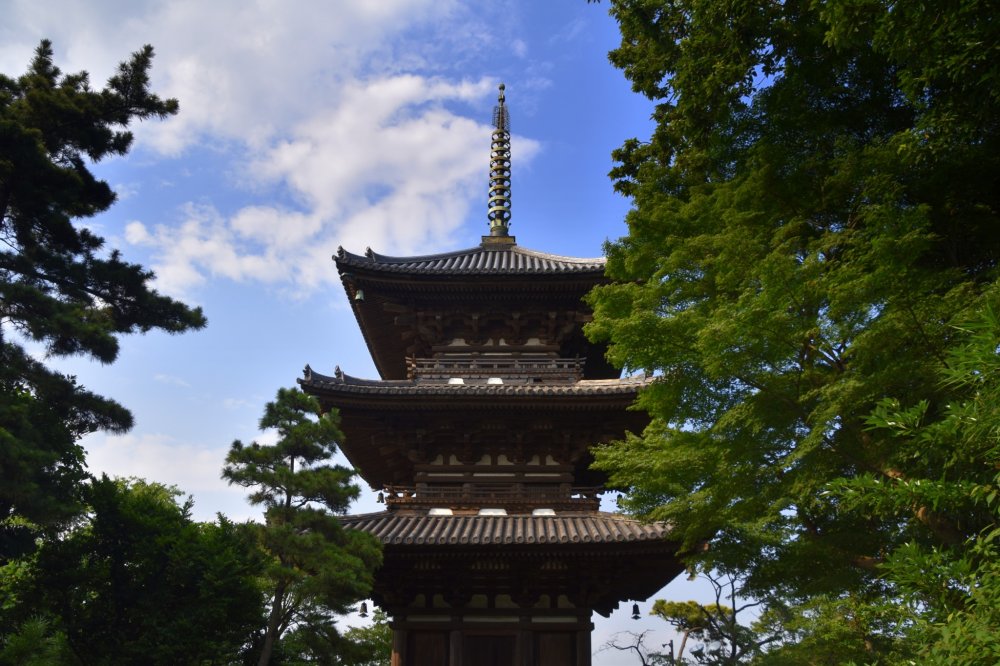 Three-story pagoda of old Tomyoji temple, an iconic symbol of Sankeien garden