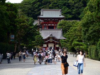 Pass the torii gate and you'll see the main hall beyond the Mai-den (dancing platform)