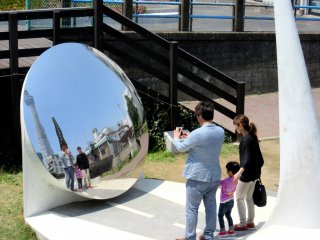 Family photo. Round mirror on the way to Sky Tree, Tokyo