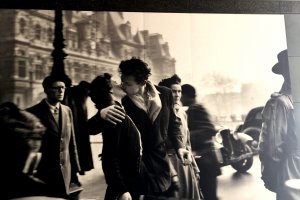 Famous photograph, 'The Kiss by the Hôtel de Ville,' by Robert Doisneau decorates the outside wall of TOP