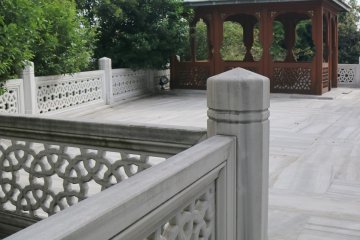 Patterned stone and marble line the courtyard outside the prayer hall