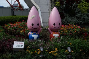 Kawaii figures outside Tokyo Tower