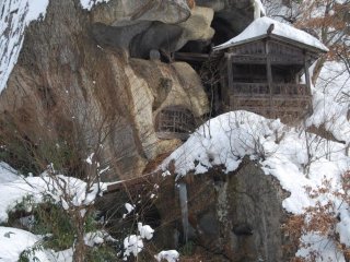 Caves carved into the volcanic rock of the mountain were used for prayer and ascetic practice in the old days