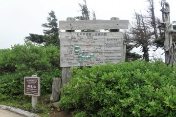 A signboard details the trails