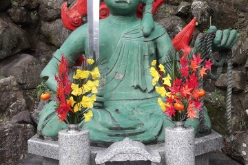A statue at Anraku-ji temple, on the way to the falls