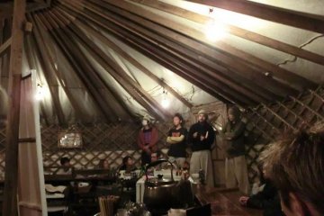 Nightly meeting in the yurt cafe/bar