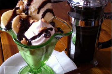 Ice-cream parfait with fried bread pieces, french press coffee
