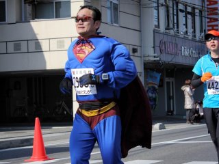 Superman is making pretty good time, despite his less than ideal attire.