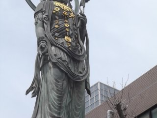 The tall, imposing statue of the Kannon
