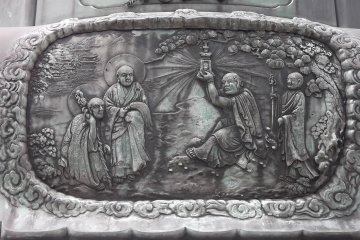 Detail from the base of the Kannon statue