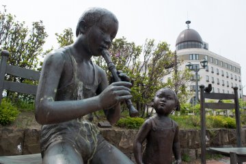 Statues by the main canal of Otaru
